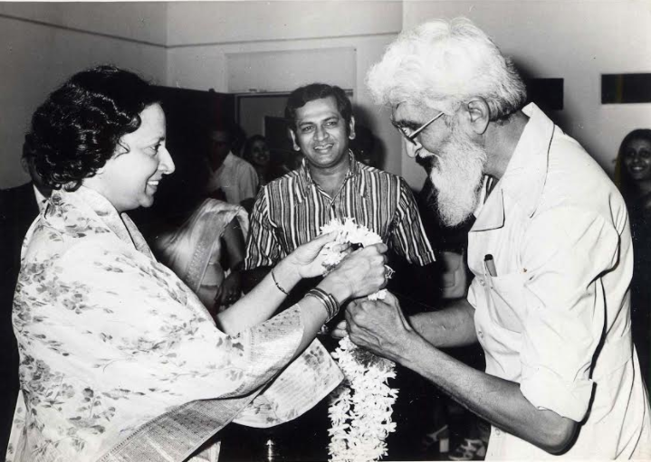 Rani Vijaya Devi greeting M.F. Husain at his exhibition for the society in the 70s. Mr.S.M. Krishna, Chief Guest looks on © IMAS Archives